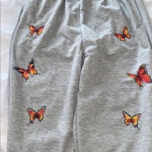 Gray stretchy butterfly sweatpants.